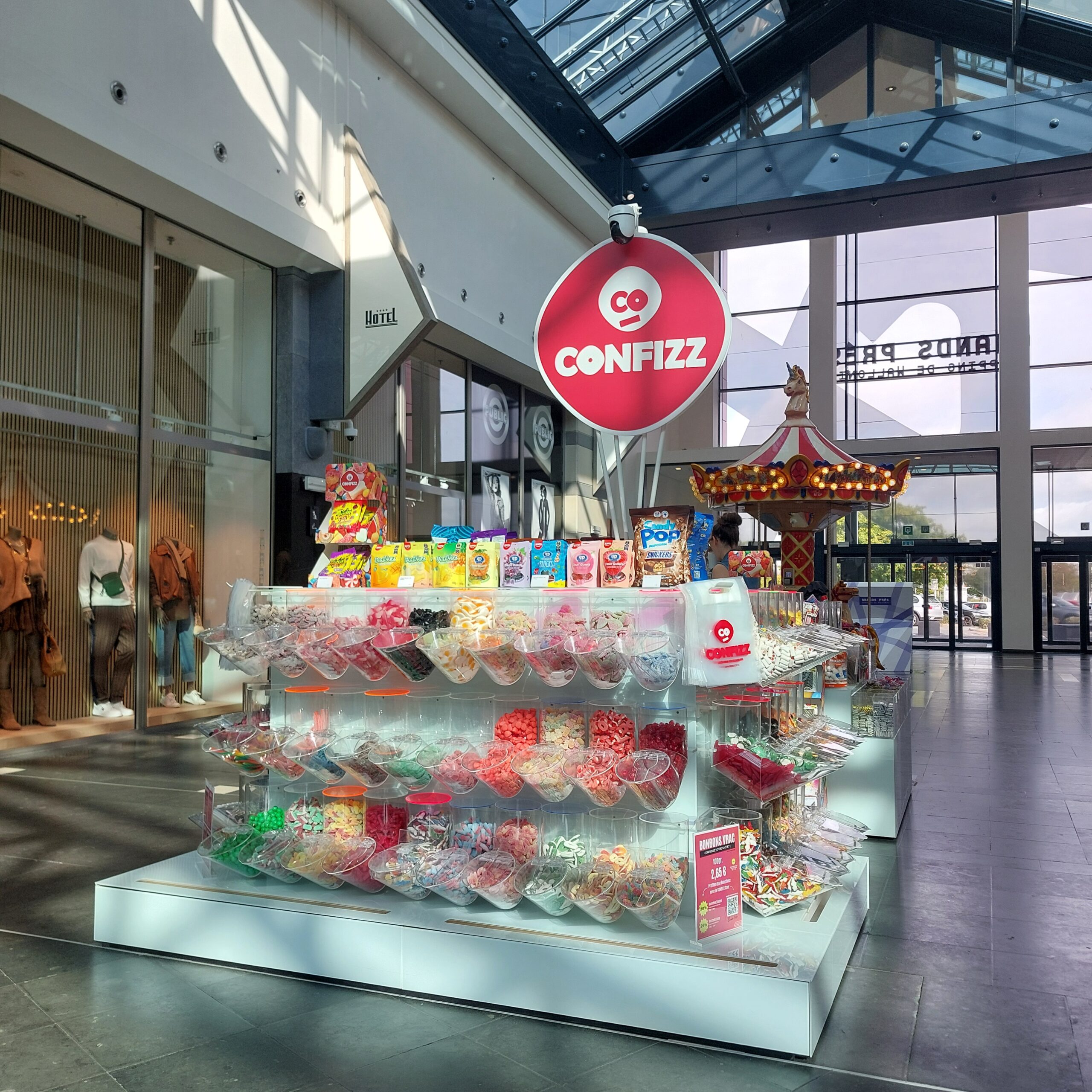 🍭 Confizz – Le meilleur magasin de bonbons et confiseries au Shopping des Grands Prés à Mons !